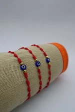 x12 red string knots blue evil eye adjustable bracelet