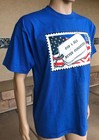 Blue EUC vintage 1995 T-shirt with red, white, and blue POW MIA Never Forgotten stamp and American flag on chest.