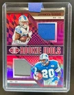 2023 Illusions Barry Sanders Jahmyr Gibbs Rookie Idols Dual Jersey Red #188/199