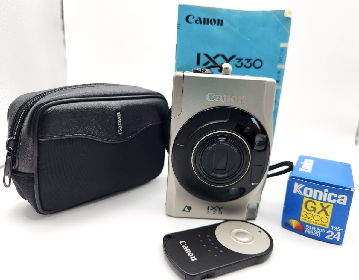 CANON IXY 330 Film Camera Set + Case, Remote, Manual & Konica GX