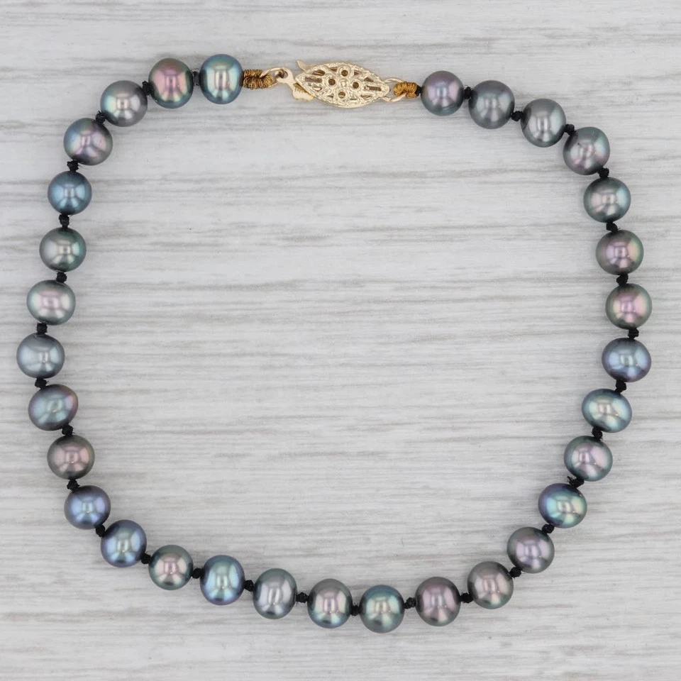 Brazalete de una sola hebra de perlas cultivadas negras de oro amarillo de 14 k 7,25" Foto 3 de 4