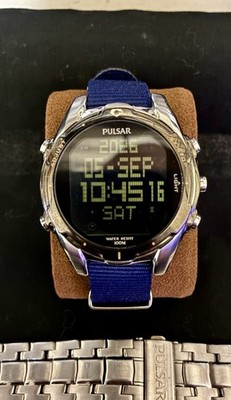 Pulsar W861-X002 Men's Digital World Time Watch with Canvas Strap & Steel Band