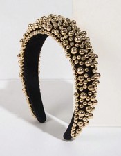 Serre-tête noir orné de