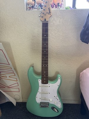 Squier Stratocaster Electric Guitar Green. comes w amp and guitar holder