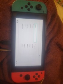 Nintendo Switch Console w/ Neon Red/Blue Joy-Con, Dock, Animal Crossing Game