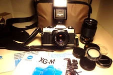 Vintage MONOLTA XG-M w/ HOYA 55mm SKYLIGHT plus MANY EXTRAS & GREAT BAG & PAPERS