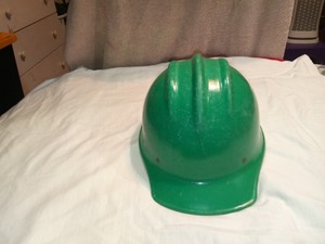 green fiberglass hard hat