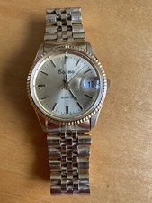 Vintage Men's Cosmo Gold Watch with Date and Gold Band
