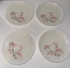 Vintage pink Pyrex family flair 8” plates. Set of four.