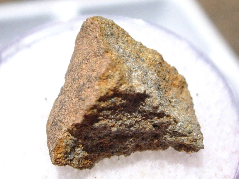 1.45 grams NWA 7401 Meteorite ( classified as EL-melt rock ) fragment with a COA