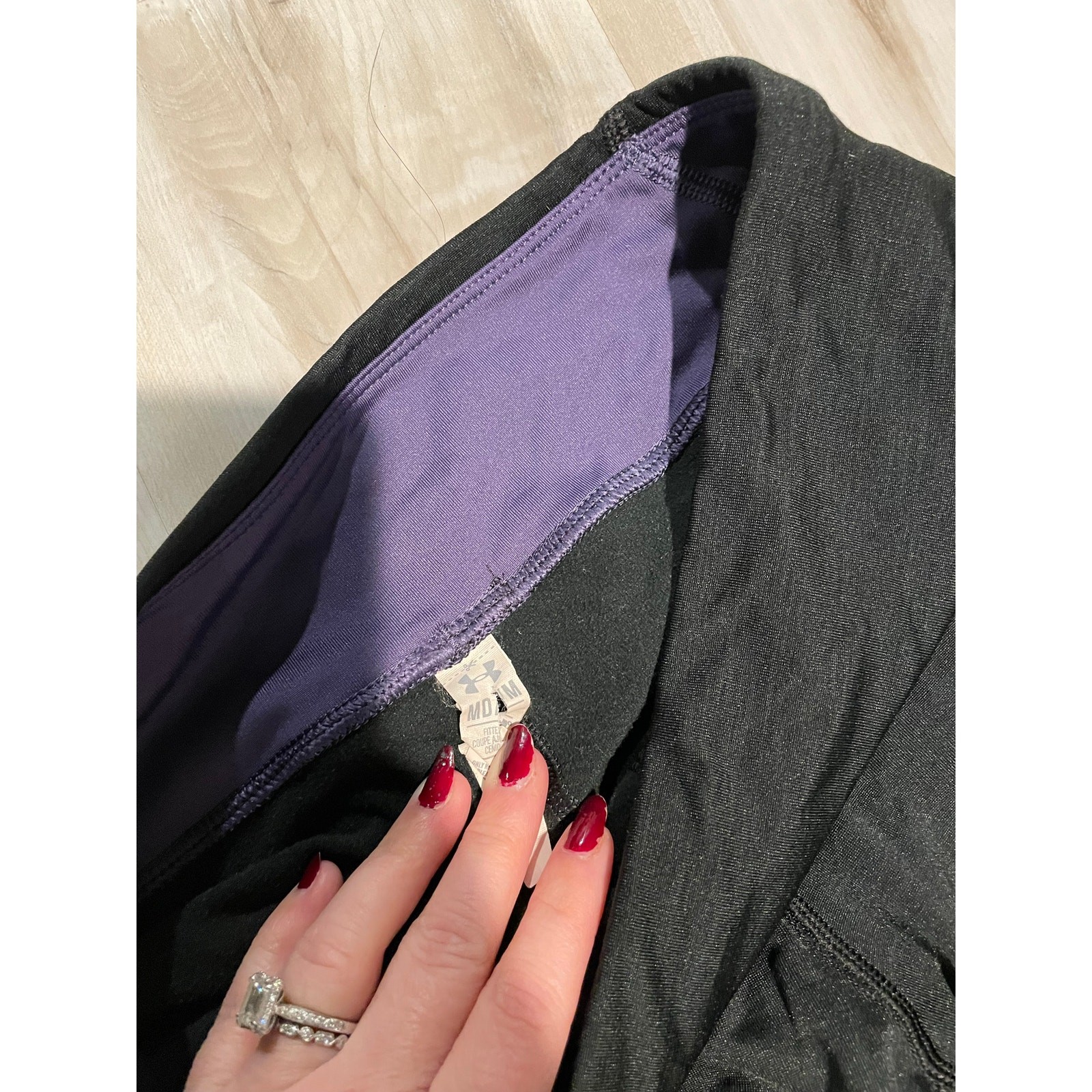 Under Armour black and purple striped leggings size Medium thumbnail 2