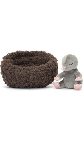 Juguete de peluche de peluche con pies rosados en cama de donut marrón - Imagen 5 de 7