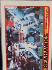 1989 Topps Seahawks Team Leaders (Krieg Winds Up) #181 Seattle Seahawks