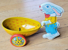 VINTAGE CHEIN Tin Litho Easter Bunny Pushing Egg cart Made In U.S.A