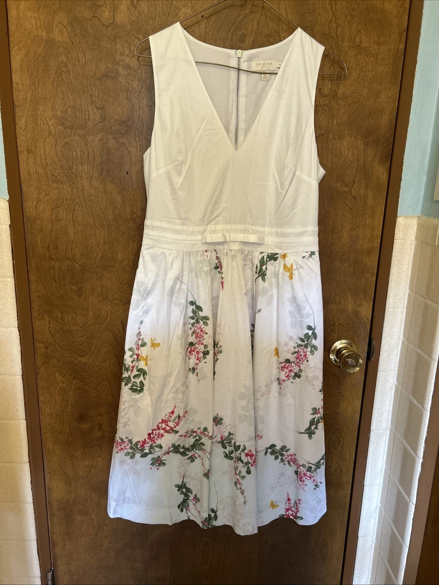 princess polly baby blue dress This is a Ted Baker Pettraa Vanilla Pleated Dip Hem Dress in white with a floral  print.The dress features accordion pleating throughout the body, creating a  textured, elegant silhouette.It is designed with main image 0