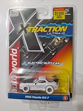 AUTO WORLD XTRACTION ULTRA G 1995 MAZDA RX 7 White Chase Slot Car