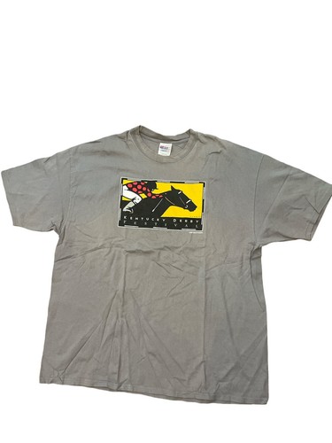 Gray vintage Kentucky Derby 1998 men’s T-shirt XXL with black horse logo, yellow oval graphic, and red brick wall accents.