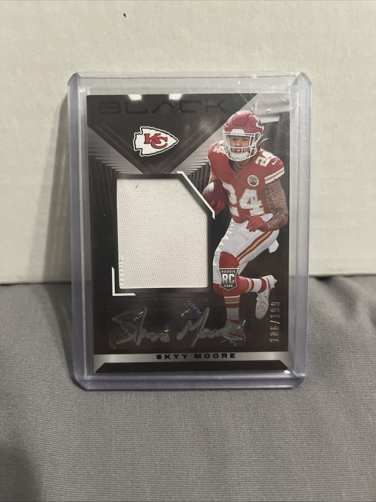 2022 Panini Black - Rookie Patch Autographs Skyy Moore # /199 (AU, MEM, RC)