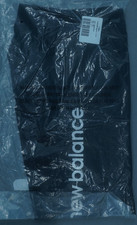 NEW BALANCE LIGHTWEIGHT TAPERED LOGO PANTS BL...