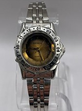 Geneva Women's Quartz Watch Brown Dial Rotating Bezel Silver Band- New Battery