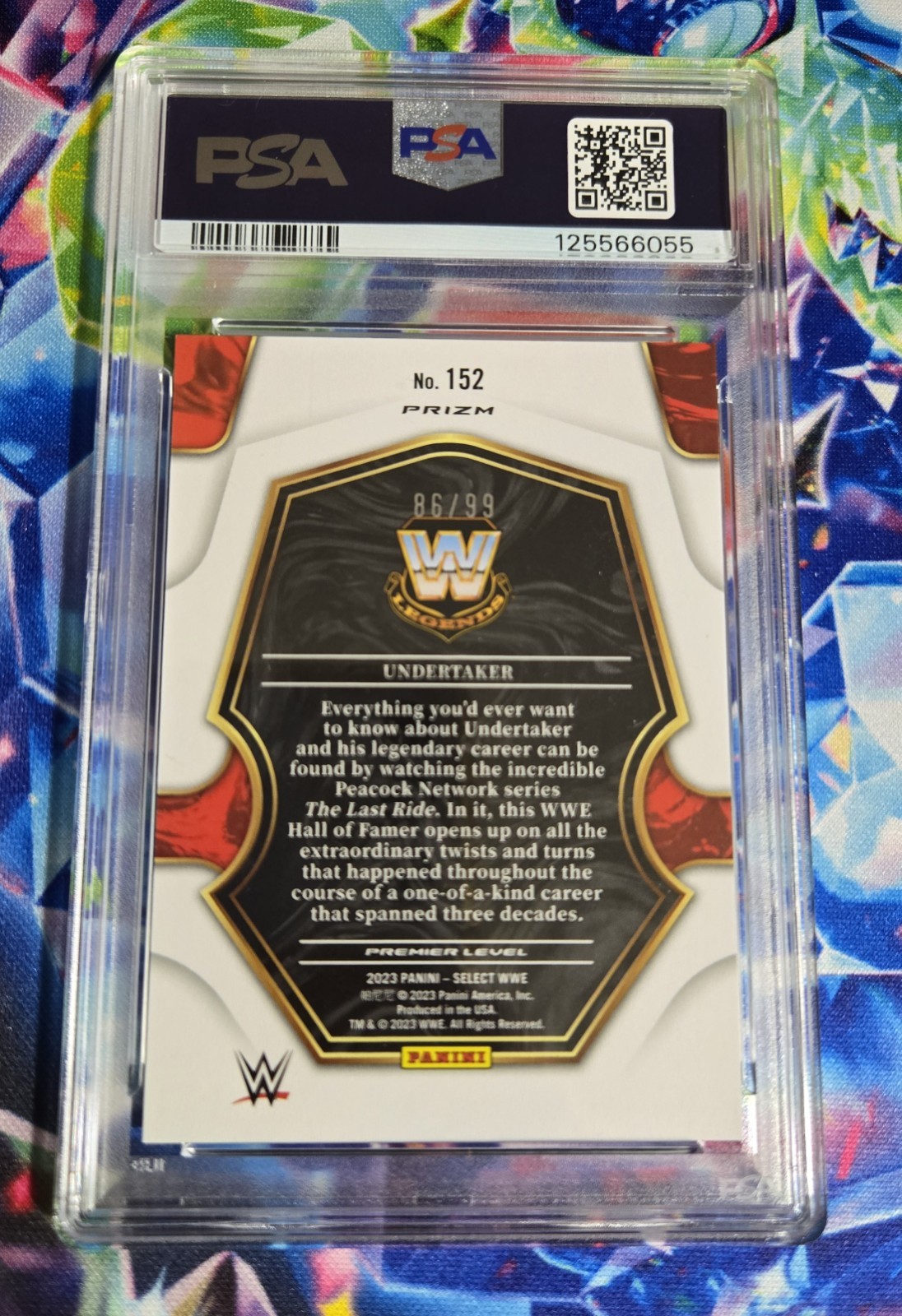 Undertaker 2023 Panini Select WWE 152 Purple Prizm /99 PSA 9 view 4