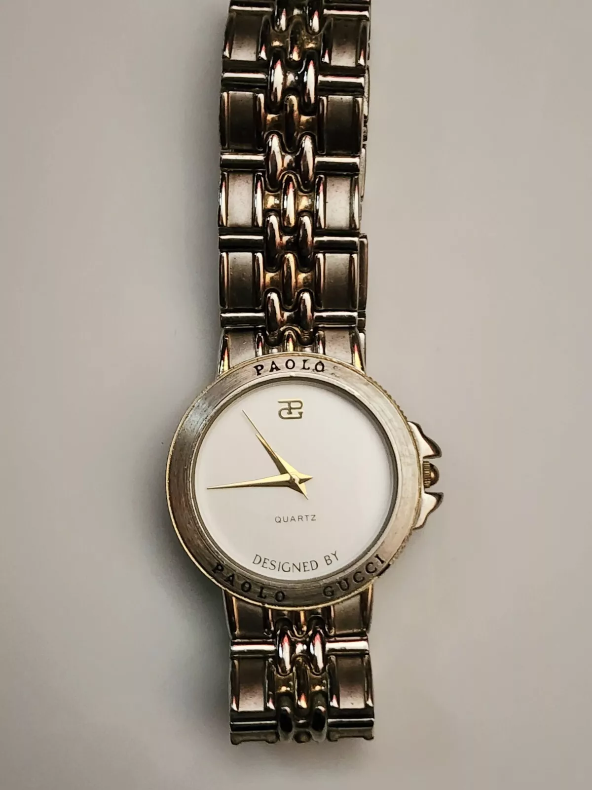 Montre bracelet élégante vintage Paolo Gucci bicolore a besoin d'une batterie neuve