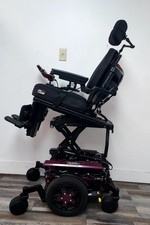 QUANTUM EDGE 3 PEDIATRIC WHEELCHAIR, TILT, RECLINE,LEGS,LIFT. 20 MILES ONLY.