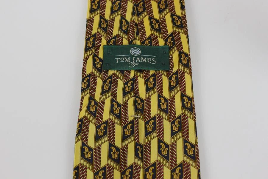 Corbata de seda Tom James. Motivo de hoja floral amarillo con rojo y azul. Foto 3 de 4
