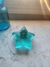 Fire and Light Aqua Shooting Star Glass Paperweight. 