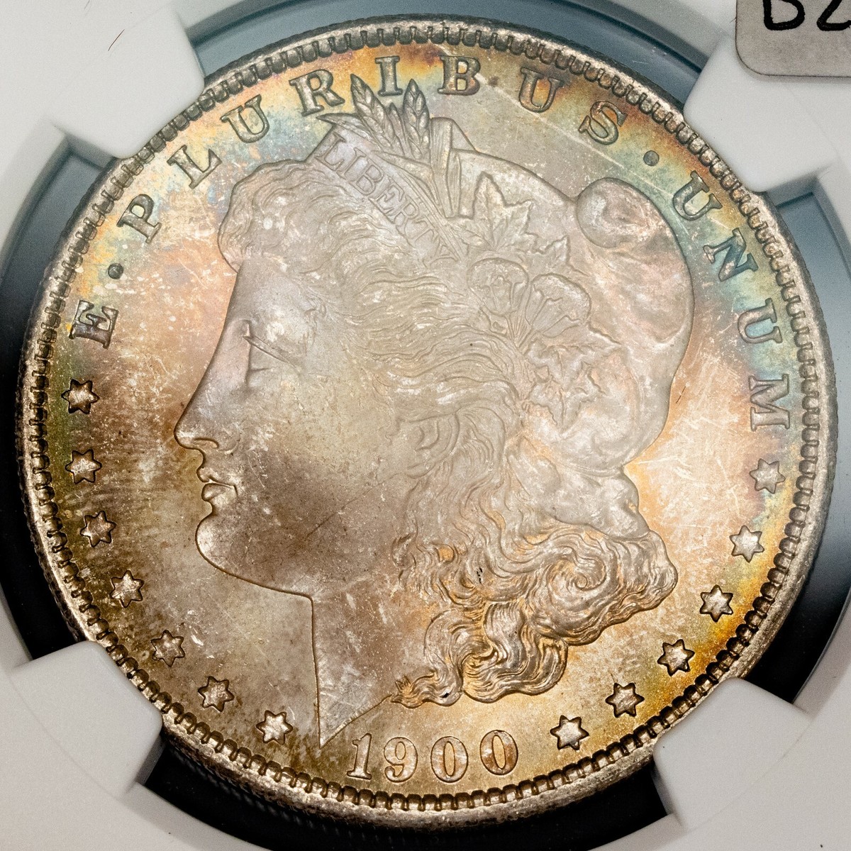 1900-O $1 Morgan Dollar - Rainbow Terminal Toning - NGC MS 65