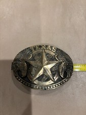 "Texas " Belt Buckle with Star in the middle. Made by Award Design Metals