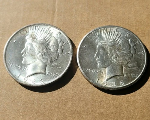 TWO Peace Silver Dollars Below Melt. 1923 & 1926. XF Coins Tape Residue/Toning.