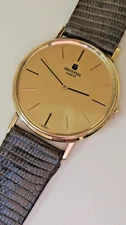 Universal Geneve 18k yellow gold manual wind