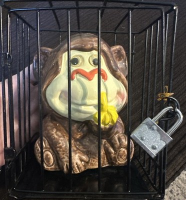 Vintage Ceramic Monkey Coin Bank Figurine in Black Metal Cage