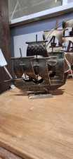 Small Wooden Model Ship with Black Cross Sails