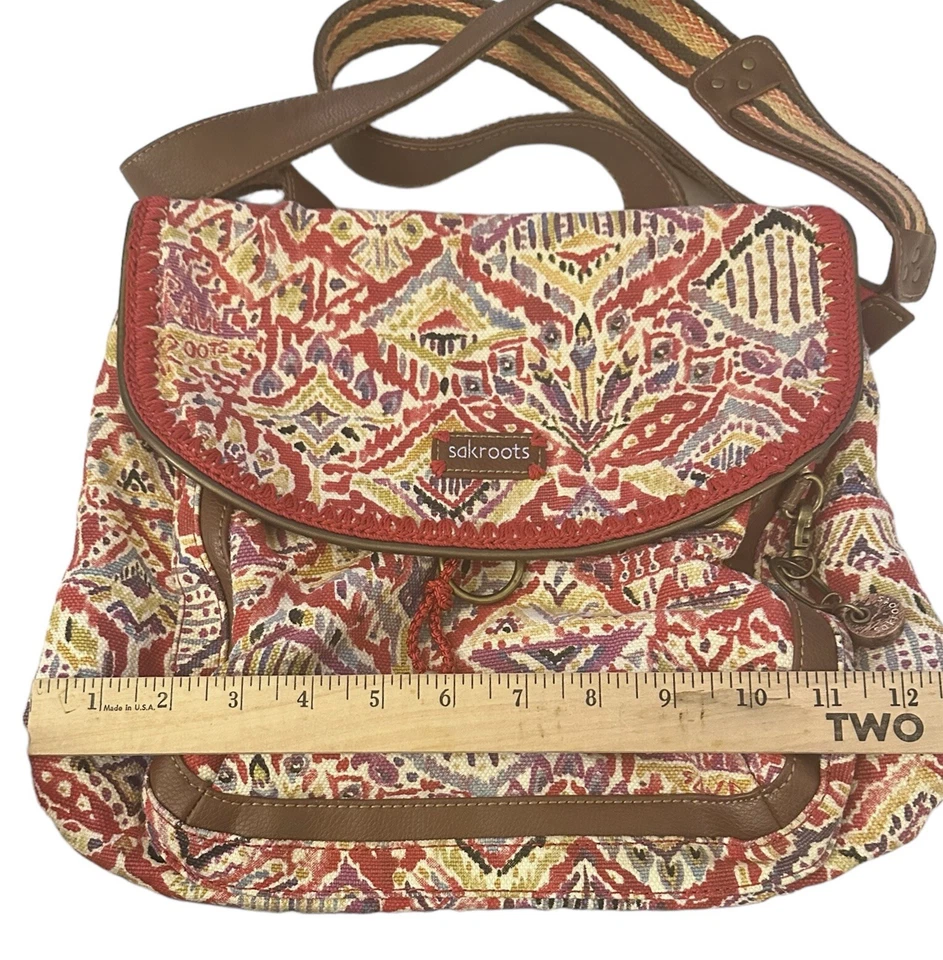 Mochila/cartera bandolera floral roja olímpica Sakroots, bolso -sin evidencia de desgaste- Foto 2 de 4