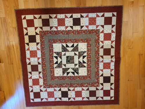 Quilted Wall Hanging Autumn colors Black Red Rust Tan Star Pattern 46 in sq.