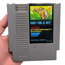 Thumbnail of ebay&reg; auction 306825841947 | Nintendo NES - Donkey Kong jr. Math  - Modul mit Schuber - Sehr Gut - Händler ✓