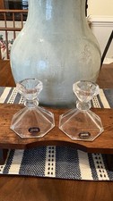 A pair of 24% lead crystal octagonal candle holders made in the USA.