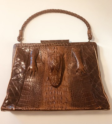 alligator head purse