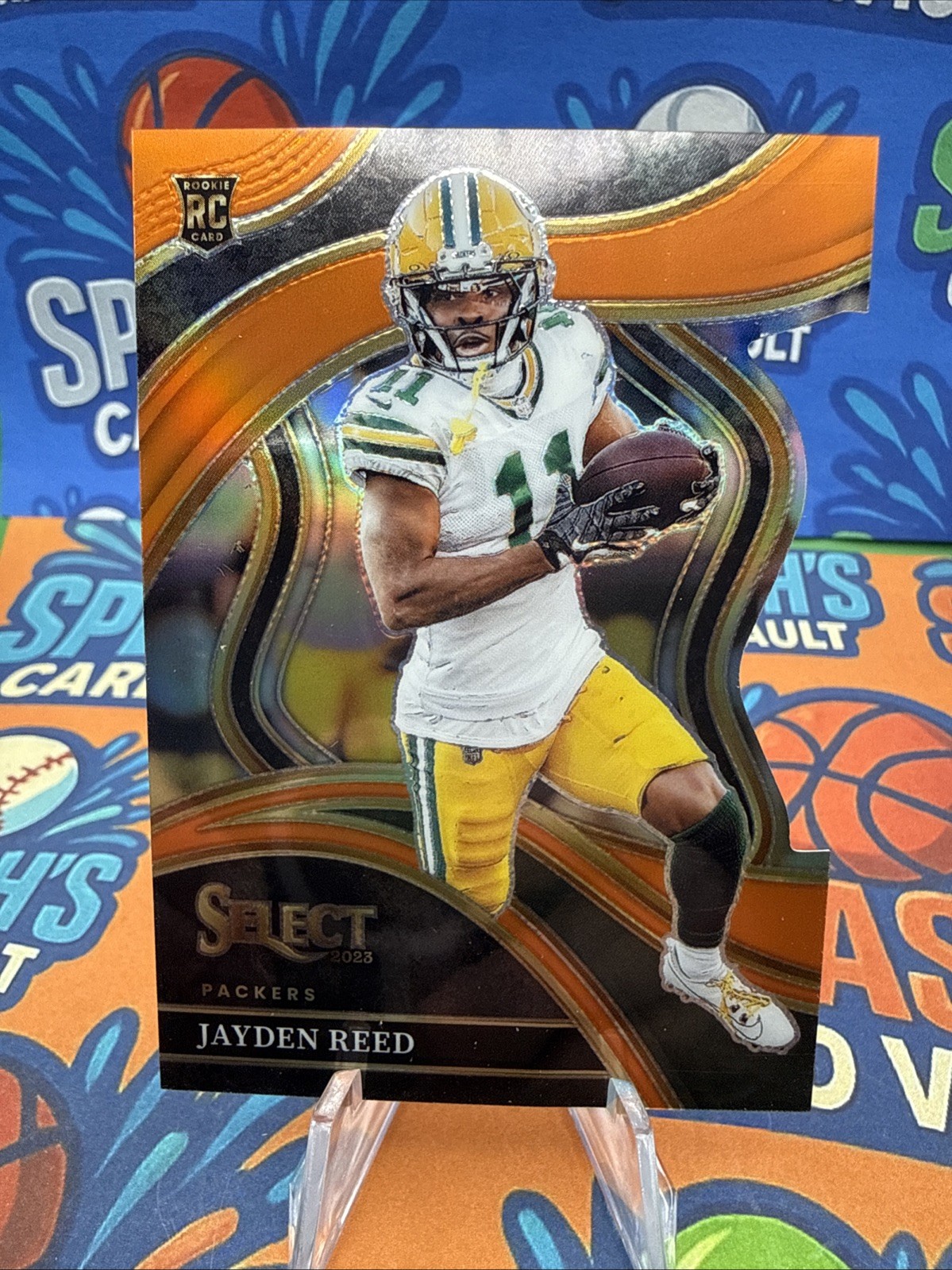 2023 Panini Select - Club Level Jayden Reed #258 Orange Prizm Die-Cut /399 (RC)