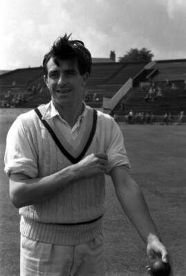 Fred Trueman is pictured rolling his sleeves up 1950s Old Photo