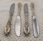 Four Wallace Sterling Silver Rose Point Individual Butter Spreader Knives