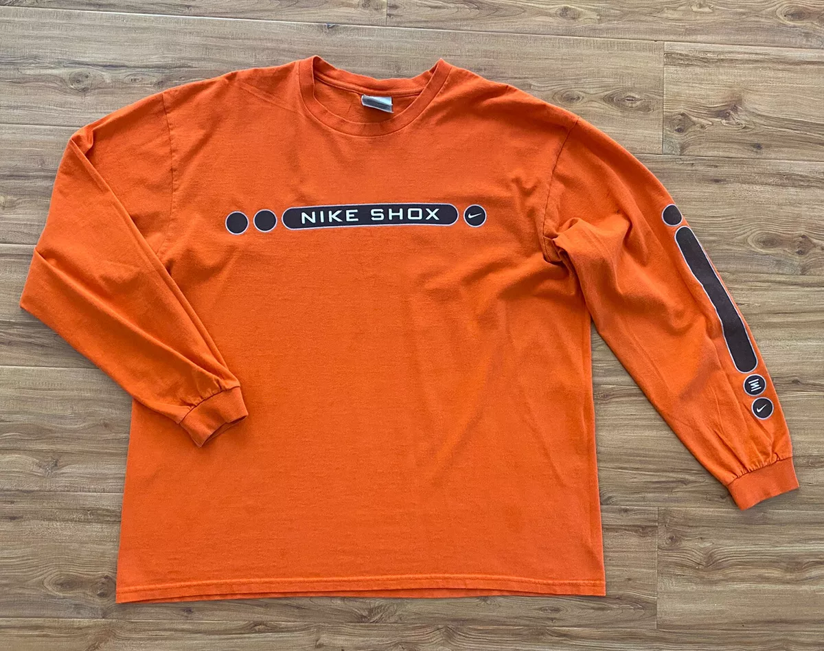 Orange nike long sleeve top
