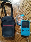VINTAGE NINTENDO GAMEBOY COLOR CGB-001 TEAL COLOR WITH LIGHT AND POUCH
