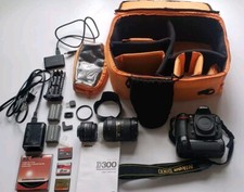 Nikon D300, Grip, 50mm  18-200mm Lens, Bag, and Accessories