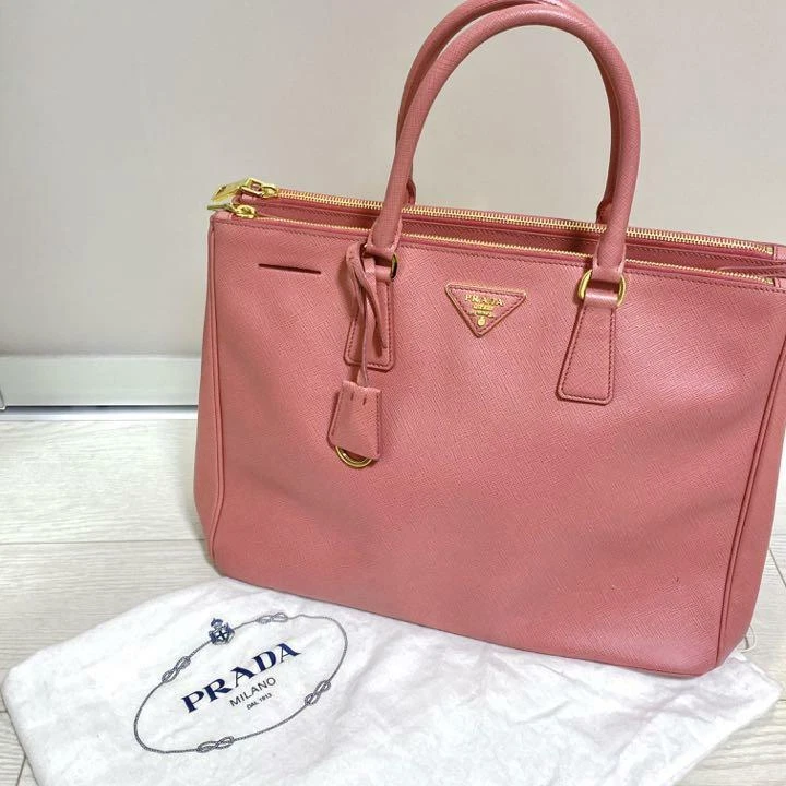 Sold Prada Saffiano Alma 30 cm, pink, beautiful condition, no straps.