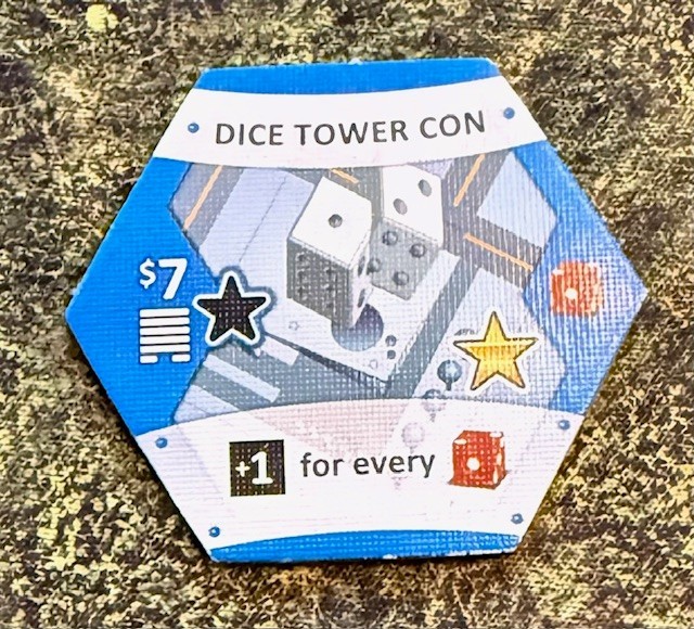 Suburbia Dice Tower Con Promo Tile by Bezier Dice Tower 2015