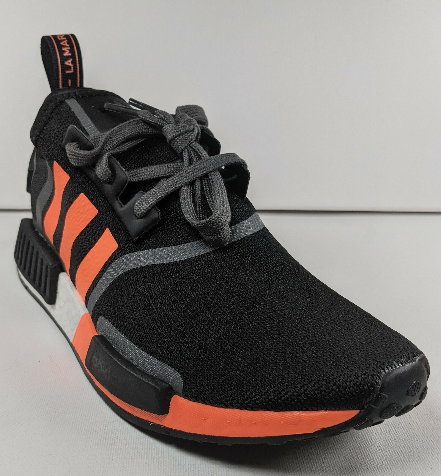 black orange nmd