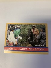 1990 NBA Hoops Inside Stuff Lights, Camera, NBA Action Karl Malone...on a horse?
